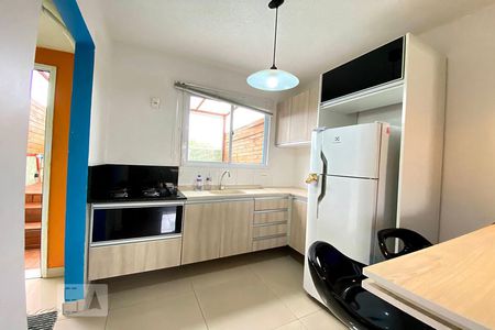 Cozinha - Armários de casa de condomínio à venda com 2 quartos, 56m² em Canudos, Novo Hamburgo