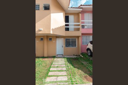 Casa de condomínio para alugar com 85m², 2 quartos e 2 vagasFachada e garagem