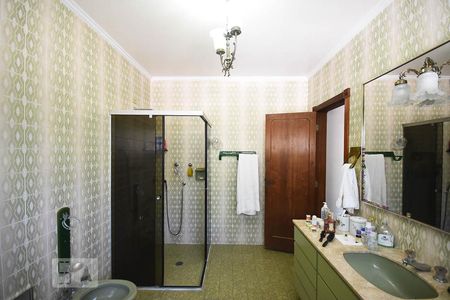 Casa à venda com 670m², 4 quartos e 6 vagasBanheiro suíte 1