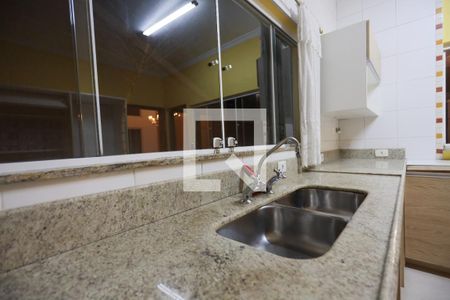 Casa de condomínio para alugar com 350m², 4 quartos e 2 vagasCozinha 