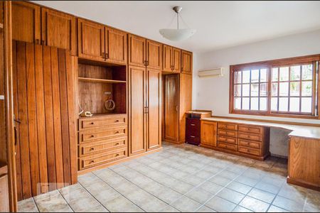 Suíte 1 de casa à venda com 4 quartos, 300m² em Jardim Botânico, Porto Alegre