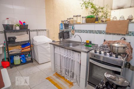 Casa de condomínio à venda com 330m², 3 quartos e 3 vagasCozinha e Área de Serviço