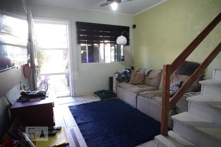 Sala de casa de condomínio à venda com 3 quartos, 110m² em Humaitá, Porto Alegre
