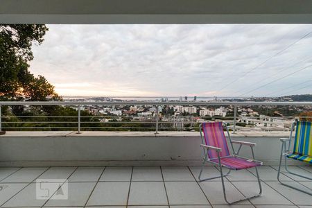 Sacada da Sala de Estar de casa à venda com 4 quartos, 450m² em Nonoai, Porto Alegre