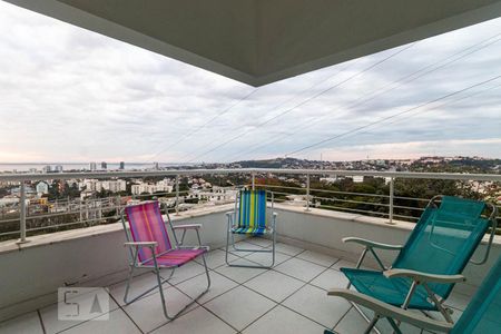 Sacada da Sala de Estar de casa à venda com 4 quartos, 450m² em Nonoai, Porto Alegre