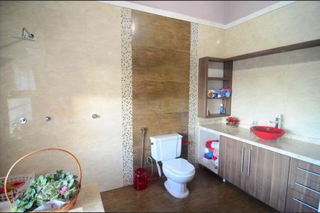 Casa à venda com 265m², 4 quartos e 4 vagasBanheiro suíte