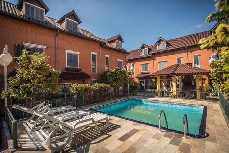 Casa de condomínio à venda com 130m², 3 quartos e 2 vagasÁrea comum - Piscina