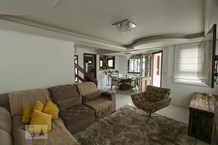 Sala de casa de condomínio à venda com 3 quartos, 220m² em Hípica, Porto Alegre