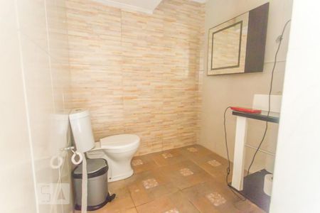 Casa de condomínio para alugar com 380m², 3 quartos e 2 vagasBanheiro de Serviço