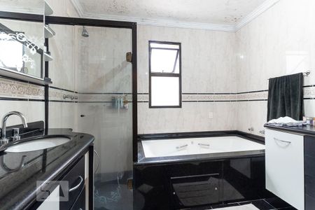 Casa à venda com 220m², 4 quartos e 2 vagas Casa à venda com 220m², 4 quartos e 2 vagasBanheiro da Suíte 1
