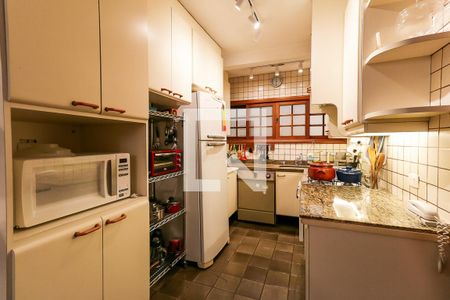 Casa de condomínio para alugar com 220m², 4 quartos e 3 vagasCozinha