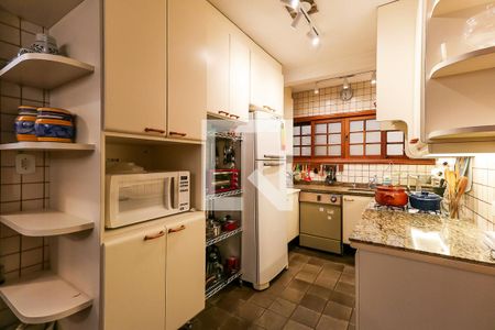 Casa de condomínio para alugar com 220m², 4 quartos e 3 vagasCozinha