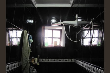 Casa à venda com 413m², 5 quartos e 6 vagasBanheiro Suíte 2