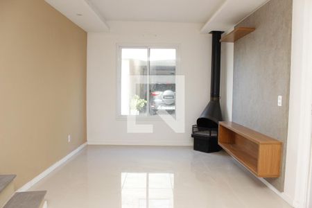Sala de casa de condomínio para alugar com 3 quartos, 130m² em Ipanema, Porto Alegre