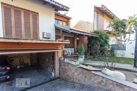 Garagem de casa à venda com 4 quartos, 340m² em Tristeza, Porto Alegre
