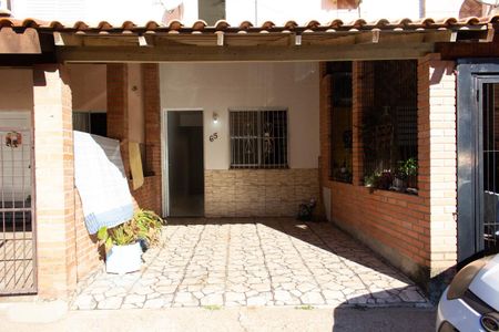 Fachada de casa de condomínio para alugar com 2 quartos, 68m² em Vila Nova, Porto Alegre