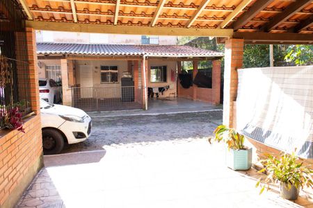 Sala - Vista de casa de condomínio para alugar com 2 quartos, 68m² em Vila Nova, Porto Alegre