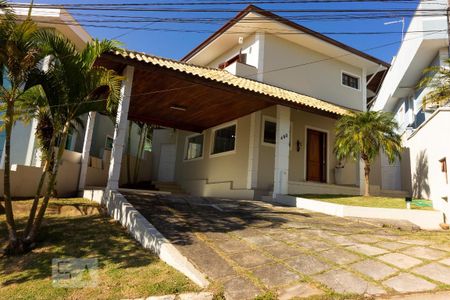 Casa de condomínio para alugar com 380m², 4 quartos e 5 vagasFachada