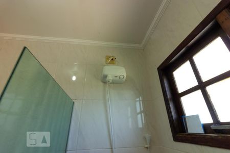 Casa de condomínio para alugar com 380m², 4 quartos e 5 vagasBanheiro Suite 1