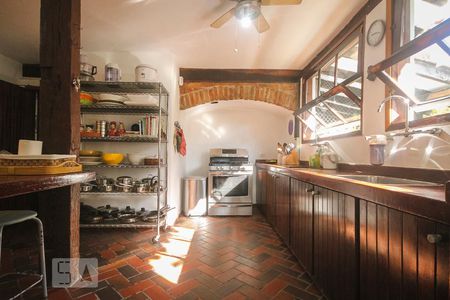 Casa de condomínio à venda com 450m², 4 quartos e 3 vagas Casa de condomínio à venda com 450m², 4 quartos e 3 vagasCozinha