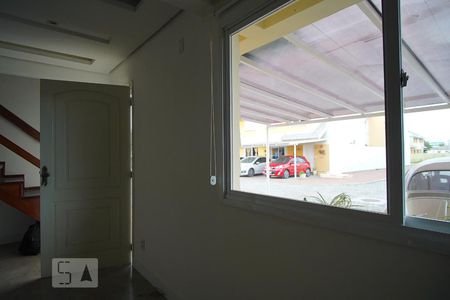 Sala de casa de condomínio para alugar com 3 quartos, 105m² em Olaria, Canoas