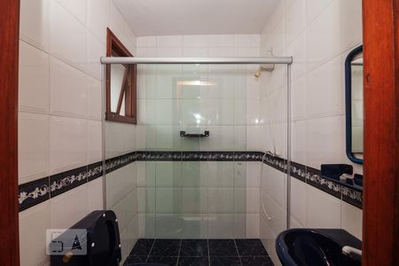 Banheiro de casa de condomínio à venda com 3 quartos, 183m² em Vila Nova, Porto Alegre
