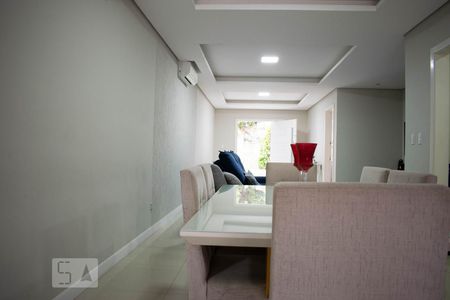 Sala de Estar de casa de condomínio à venda com 4 quartos, 213m² em Vila Nova, Porto Alegre