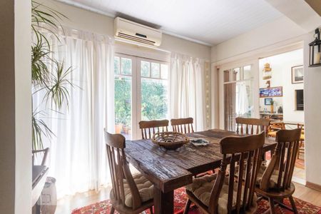 Sala de Estar de casa de condomínio à venda com 3 quartos, 191m² em Pedra Redonda, Porto Alegre