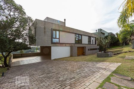 Casa de condomínio à venda com 500m², 4 quartos e 6 vagasFachada