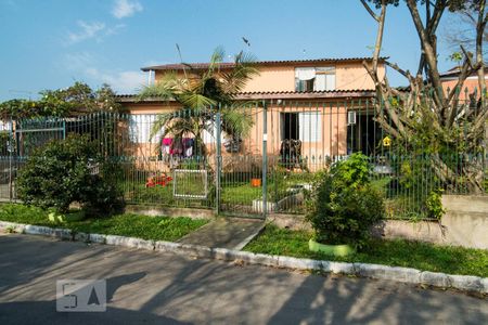 Fachada de casa à venda com 4 quartos, 240m² em Campo Novo, Porto Alegre