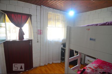 Quarto 1 de casa à venda com 3 quartos, 110m² em Guajuviras, Canoas