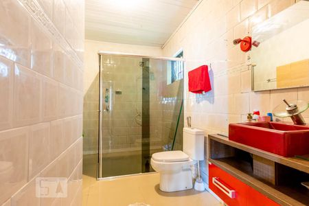 Banheiro da suíte de casa à venda com 3 quartos, 110m² em Teresópolis, Porto Alegre