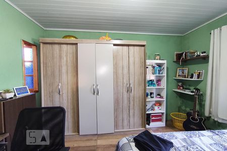 Quarto 2 de casa à venda com 4 quartos, 80m² em Guajuviras, Canoas