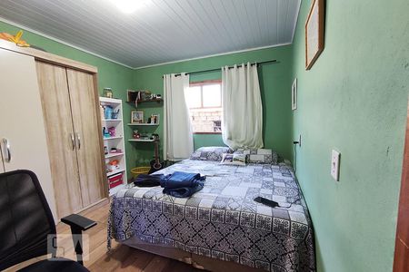 Quarto 2 de casa à venda com 4 quartos, 80m² em Guajuviras, Canoas