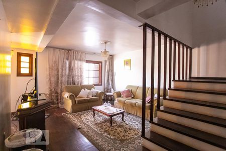 Sala de casa à venda com 4 quartos, 150m² em Vila Nova, Porto Alegre