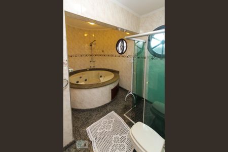 Casa à venda com 358m², 4 quartos e 4 vagasbanheiro da Suite