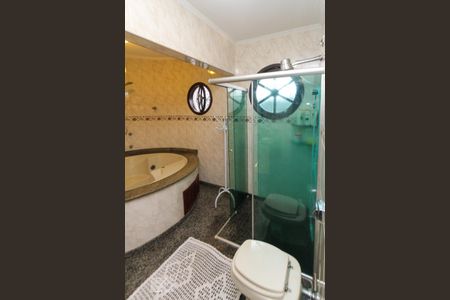 Casa à venda com 358m², 4 quartos e 4 vagasbanheiro da Suite