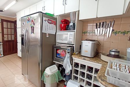 Casa de condomínio à venda com 420m², 4 quartos e 4 vagas Casa de condomínio à venda com 420m², 4 quartos e 4 vagasCozinha