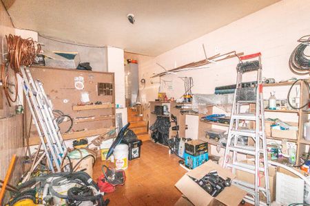 Casa à venda com 320m², 5 quartos e 1 vaga Casa à venda com 320m², 5 quartos e 1 vagaGaragem