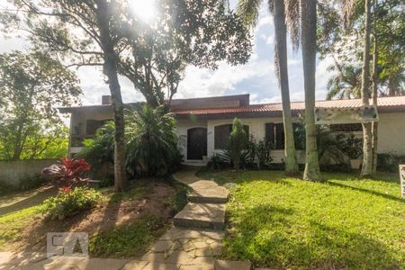 Fachada de casa à venda com 3 quartos, 400m² em Ipanema, Porto Alegre