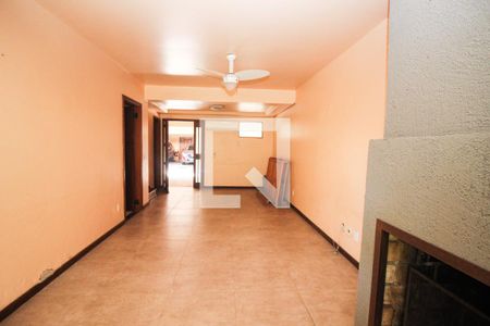 Sala de casa de condomínio para alugar com 3 quartos, 205m² em Ipanema, Porto Alegre