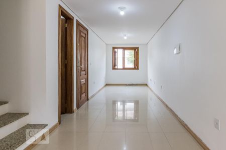 Sala de casa de condomínio para alugar com 4 quartos, 150m² em Vila Nova, Porto Alegre