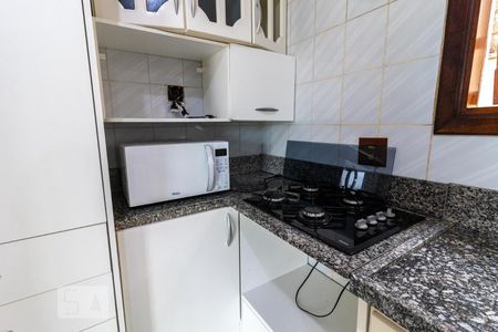 Casa à venda com 341m², 4 quartos e 8 vagasCozinha - Cooktop e Microondas