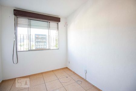 Quarto 1 de apartamento para alugar com 2 quartos, 48m² em Jardim Itu, Porto Alegre