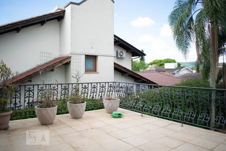 Casa de condomínio à venda com 550m², 3 quartos e 6 vagasVaranda externa