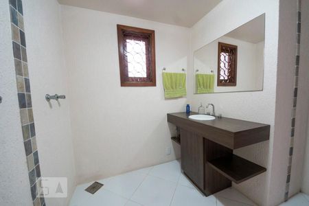 Casa à venda com 396m², 5 quartos e 4 vagasBanheiro Sala de Jogos