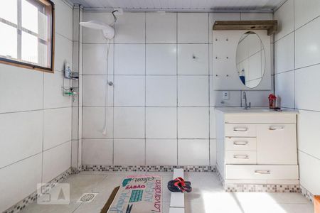 Banheiro de casa de condomínio à venda com 3 quartos, 300m² em Cavalhada, Porto Alegre