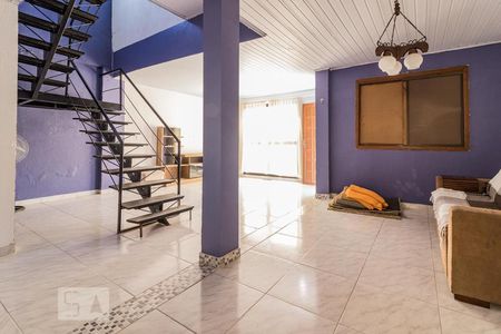 Sala de casa de condomínio à venda com 3 quartos, 300m² em Cavalhada, Porto Alegre