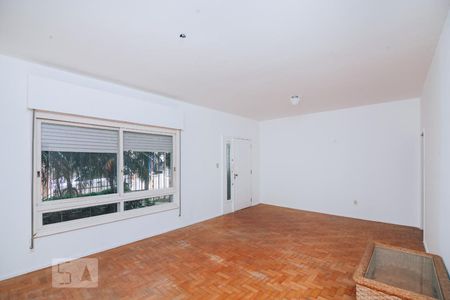 Sala vista de casa à venda com 4 quartos, 200m² em Auxiliadora, Porto Alegre