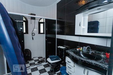 Casa à venda com 350m², 4 quartos e 3 vagasBanheiro suite 1